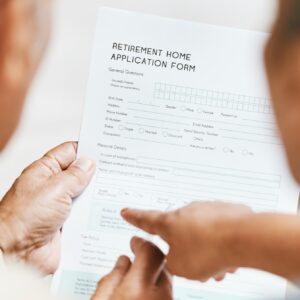 Contract, hands or senior couple with retirement paper agreement, reading legal documents or home a